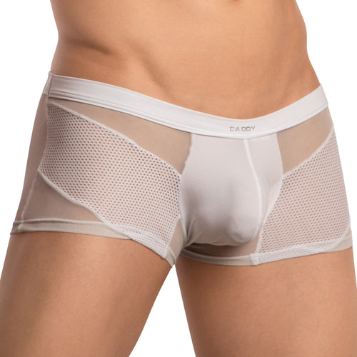 A person wearing white Daddy Breathable Mesh Boxer Trunks, featuring solid and sheer fishnet fabric panels for a seductive vibe, stands against a neutral background with the brand displayed on the waistband.