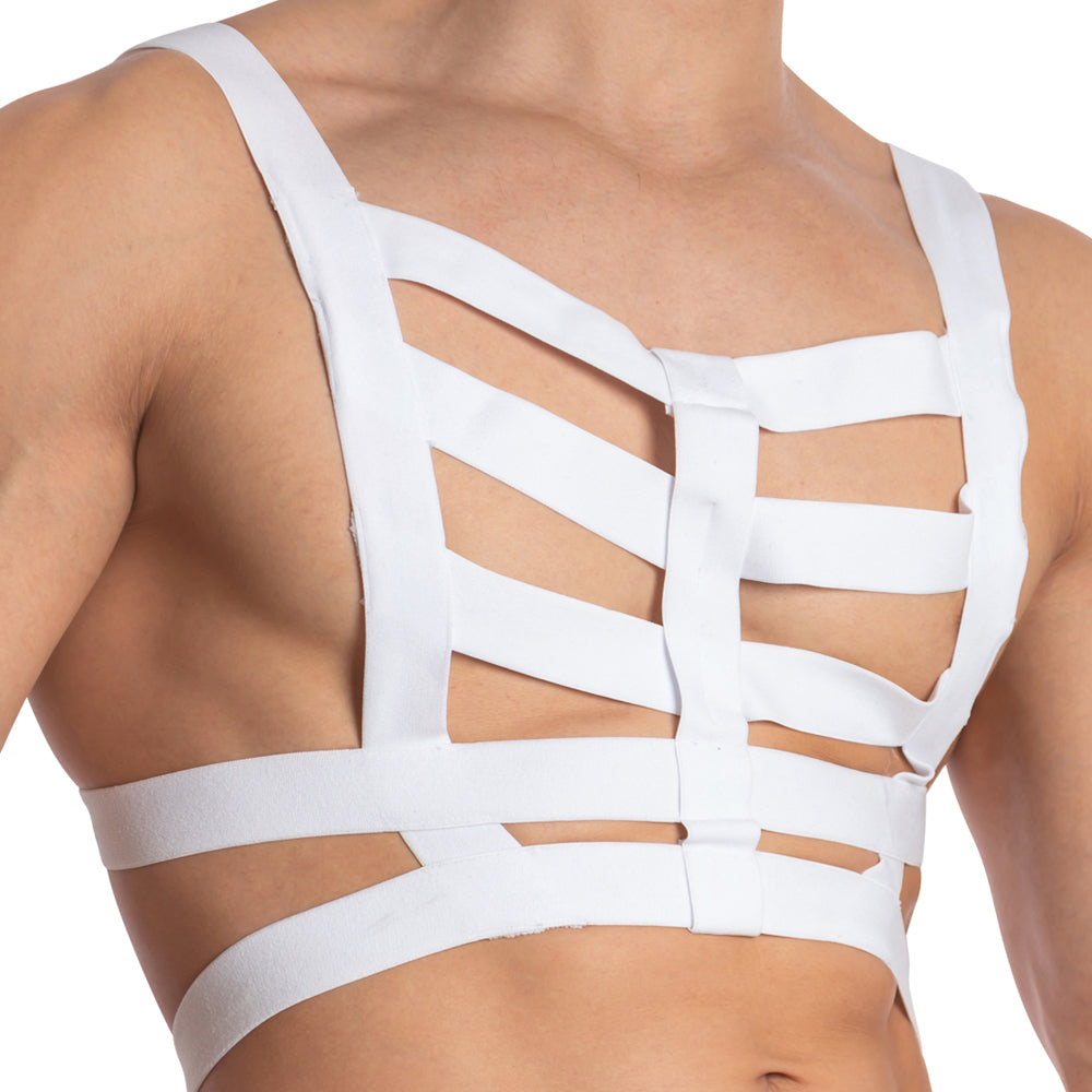 A person wearing a tailored white harness similar to the Daddy Hold On Hard Bodysuit by Daddy, featuring numerous intersecting straps on the chest and back, forming a geometric design that provides excellent support while subtly revealing skin through the open spaces.