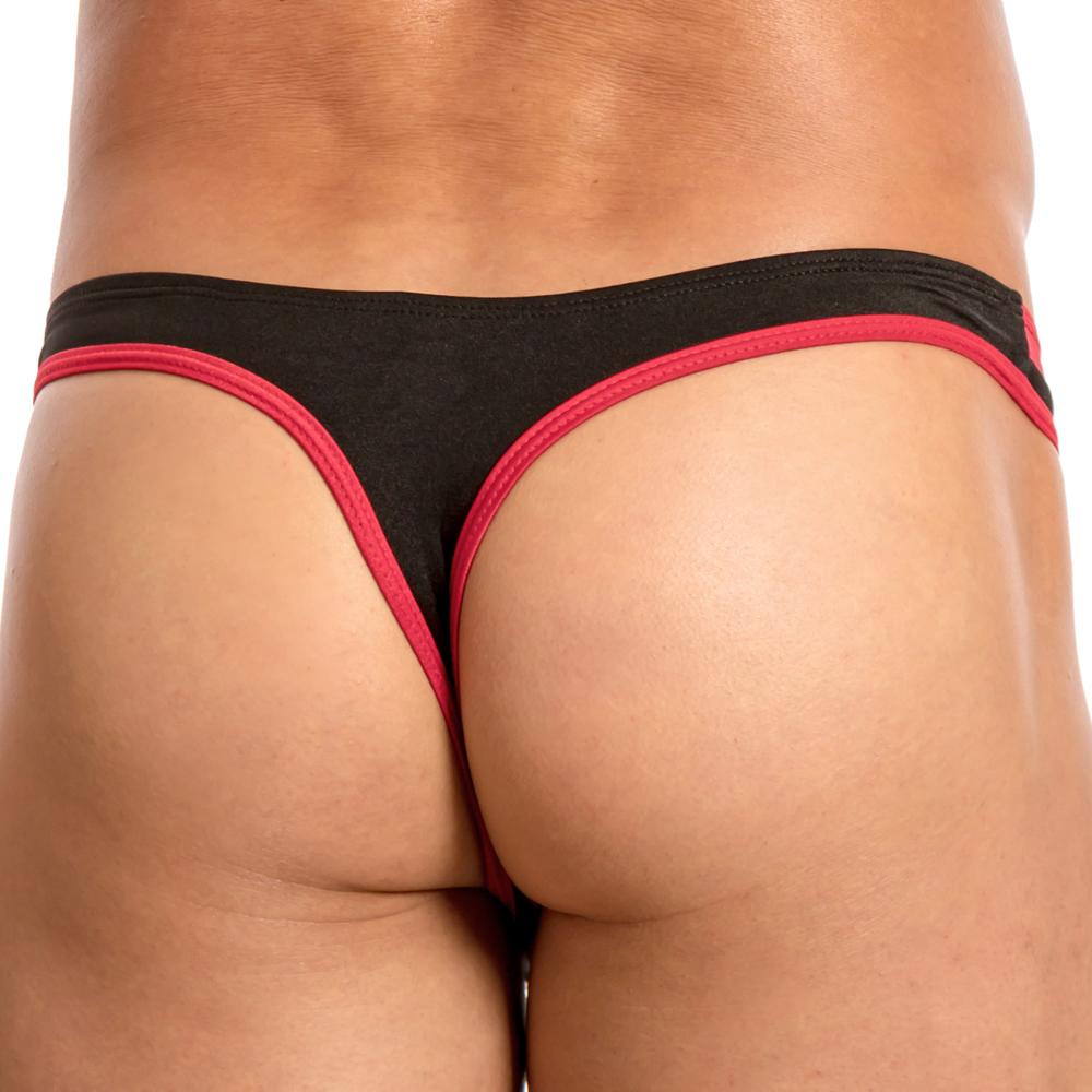 Close-up of a persons lower back and buttocks wearing the Daniel Alexander Slash Thong. The sleek design by Daniel Alexander highlights how the fit enhances with its special pouch feature in black and red.