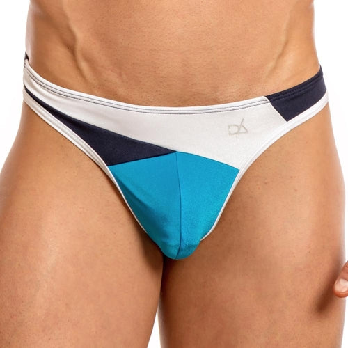 A person is wearing the Daniel Alexander Slash Thong, featuring a sleek color-blocked design in blue, white, and black that highlights the lower torso with an enhancing pouch for improved fit.
