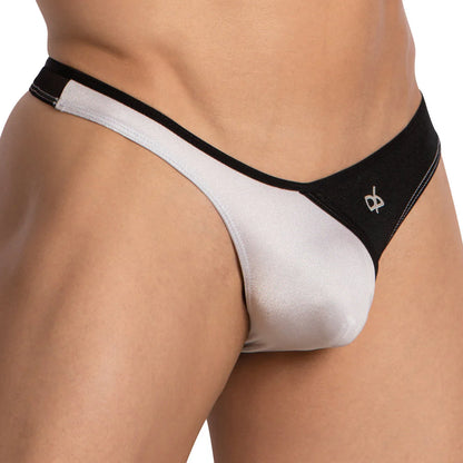 Close-up of a person wearing a Daniel Alexander Bi-Color Pouch Thong with black and gray design. This multi-color thong showcases a small waistband logo, made from luxurious fabric for ultimate comfort.