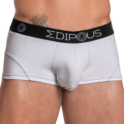 A person wears Edipous Bi-Color Sports Boxer Trunk, featuring a black waistband with the Edipous brand name and logo. The design includes a supportive pouch for comfort, and a tattoo is partially visible on the persons midriff.