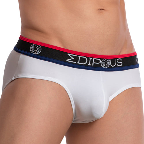 A person sports the stylish Edipous Munich Brief with a black waistband, low-rise fit, and red & blue details, featuring EDIPOUS text and circular designs. Image highlights the lower torso.