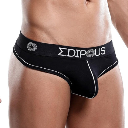 A close-up captures a person in the Edipous Micro Thong, highlighting black underwear with white trim and a sporty waistband displaying EDIPOUS and circular logos, all emphasizing a sleek midsection look.