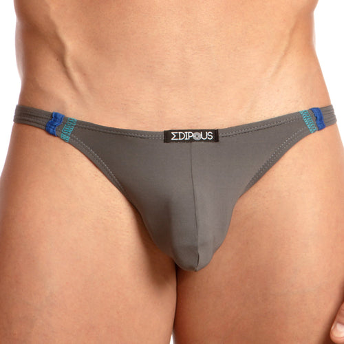 A person wearing Edipous Soft Thong with ultra-soft fabric in grey, featuring blue and green printed sides and a visible Edipous label on the waistband for a snug fit. The background is plain white.