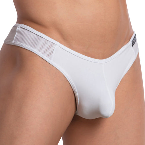 Close-up of a person wearing Edipous Maximilian Thong by Edipous, featuring white fabric with mesh side design and a stylish V-shaped back.
