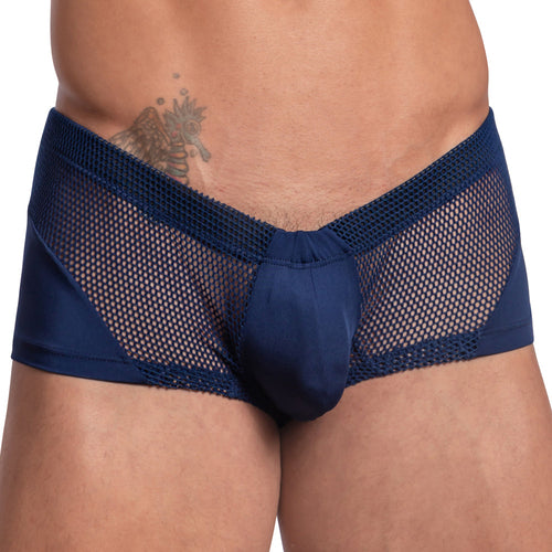 A man in navy blue Good Devil Boxer Almost Naked underwear, crafted from breathable mesh fabric. The cropped image highlights a lower abdomen tattoo and emphasizes the style and minimal coverage of the design.