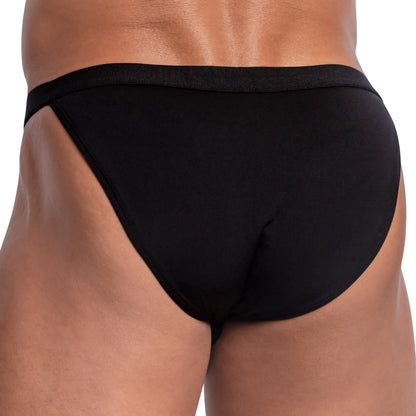 A person is shown from the back wearing Good Devil Bikinis Steel Ring Waistband, featuring a minimalist look and sleek steel ring waistband, fitted smoothly against a neutral background.