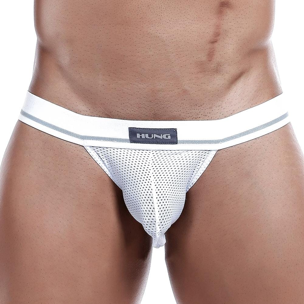 A person wears the Hung Jockstrap, featuring white mesh underwear with a wide elastic waistband and Hung branding on the front, emphasizing the breathable mesh pouch and midsection.