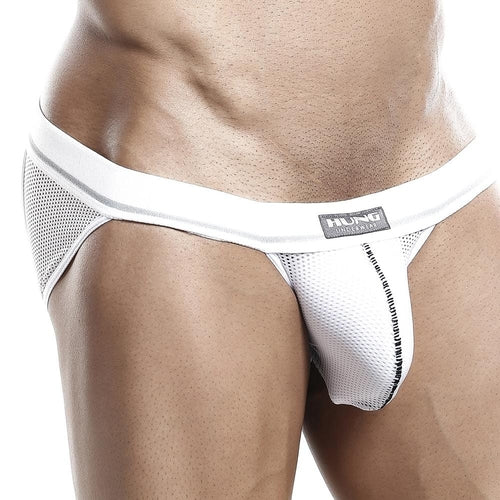 Someone is sporting Hungs white mesh Hung Jockstrap, featuring a labeled waistband for enhanced support and comfort. The breathable design accentuates the lower torso, all against a white backdrop.