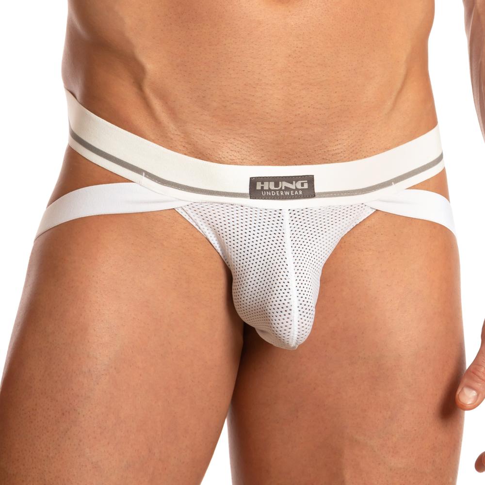 A person wearing Hungs Big Boy Jock white mesh briefs with a thick waistband and leg straps. These briefs feature a premium fabric blend and generous pouch design for superior support.