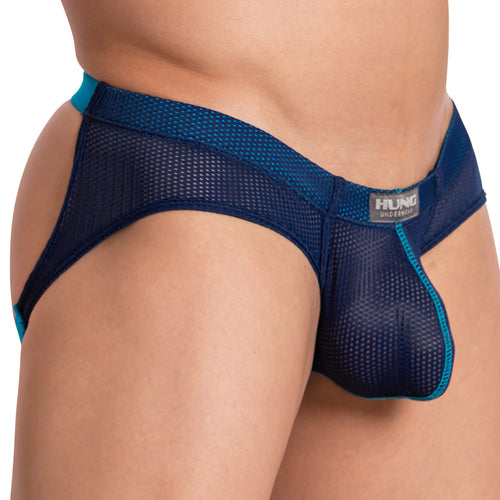 A person wearing the Hung The Colosseum Jockstrap, featuring breathable mesh fabric in blue with turquoise trim and a supportive pouch design for comfort, complete with a visible Hung brand label on the waistband.
