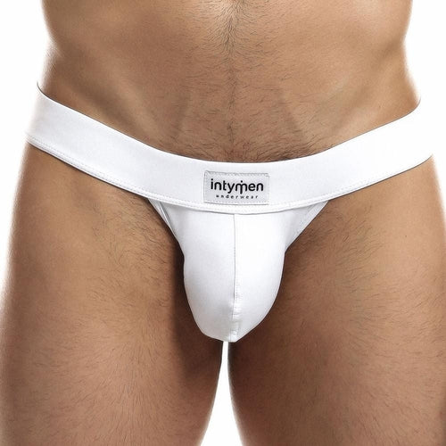 A person confidently wears the Intymen Proud Jock, featuring a branded waistband and supportive fit. The contoured pouch ensures comfort and style, offering the perfect blend of form and function.