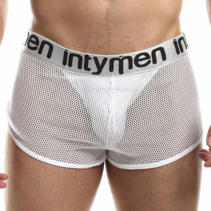 A person wears Intymens Jock Mesh Cover, white mesh boxer briefs with a gray waistband displaying Intymen in black. The focus is on their breathable mesh fabric and supportive design, ensuring exceptional comfort and style.