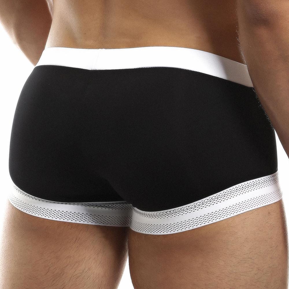 A person sports Intymen Quads Trunk, highlighting a tailored fit with a white waistband and dotted trim at the leg openings in black and white. Crafted from premium fabric, these boxer briefs offer ultimate comfort and style.
