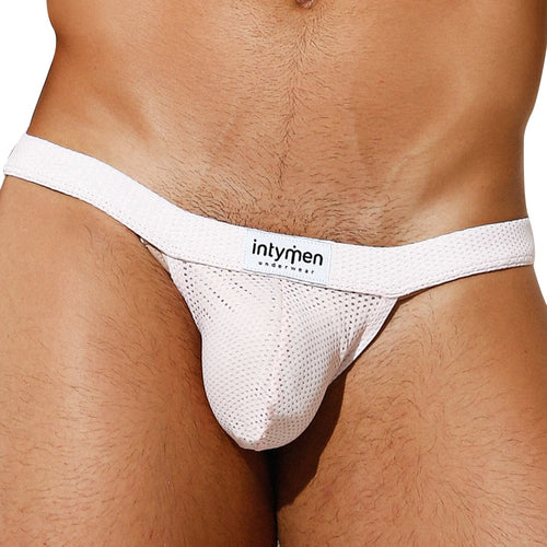 Close-up of someone wearing the Intymen Palatino Bikini with a branded intymen waistband, showcasing its textured, breathable mesh fabric and sheer pouch to highlight fit and style.