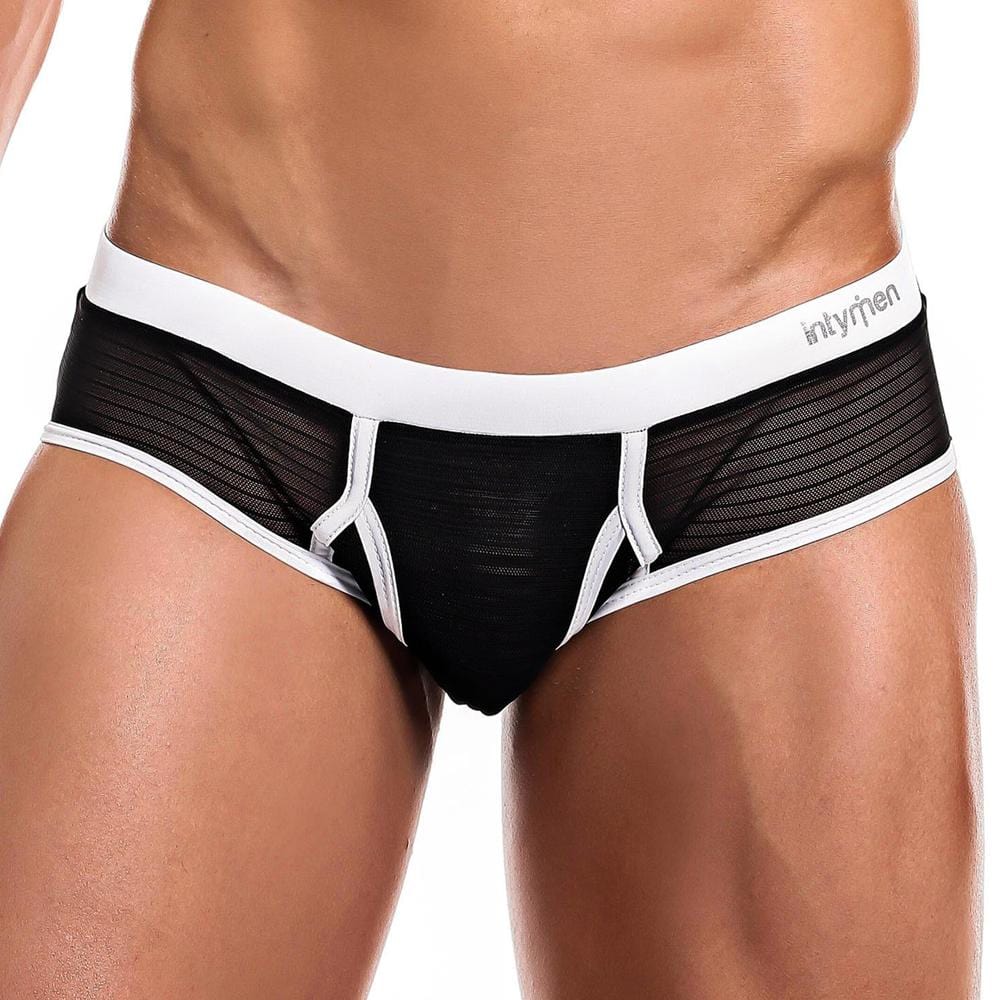 Wearing Intymen Profile Briefs highlights a stylish design featuring black mesh, sheer side panels, white piping and trim. The shaped support pouch ensures comfort, while the brand name is prominent on the white waistband. Only the torso and upper legs are shown.