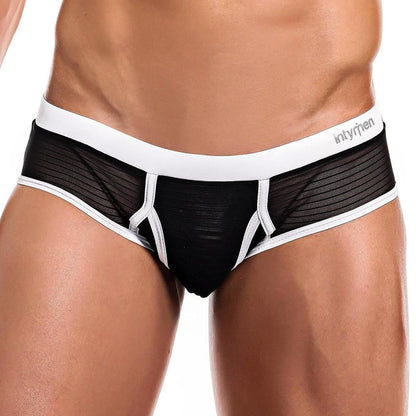 Wearing Intymen Profile Briefs highlights a stylish design featuring black mesh, sheer side panels, white piping and trim. The shaped support pouch ensures comfort, while the brand name is prominent on the white waistband. Only the torso and upper legs are shown.