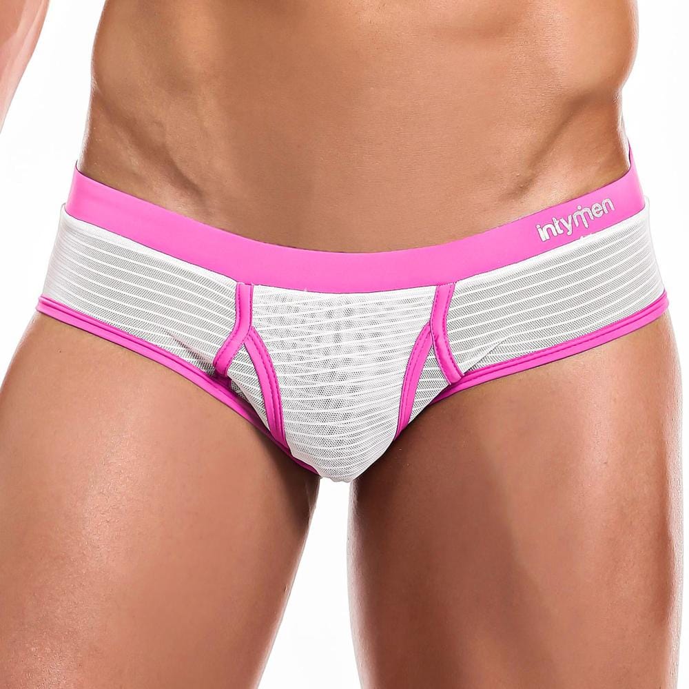 A person wears the Intymen Profile Brief with a white and pink striped pattern. The waistband is pink, displaying the Intymen brand name. The image focuses on the midsection and lower torso, highlighting a shaped support pouch for comfort.