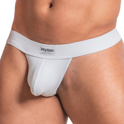 A close-up of a person wearing the Intymen Sensual Thong highlights its sleek, fitted design with a supportive front pouch. This comfortable thong is crafted from premium materials, embodying style and ease.