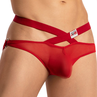 Someone wearing the Miami Jock Cross Strapped Sheer Brief, featuring crisscross straps and an elastic waistband. The red brief includes a small front logo tag, highlighting the midsection for a bold appearance.