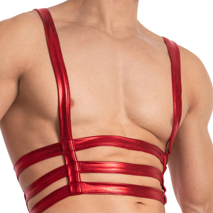 A person is shown wearing the Miami Jock Bodysuit, a shiny red harness with a seductive flair. The glossy double-strap design wraps closely around the chest and back, highlighting the striking allure of this accessory from Miami Jock.