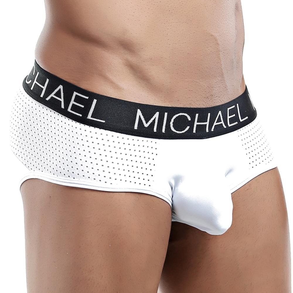 Sporting a sleek fit, the Michael Brief by Michael features a black waistband with MICHAEL branding and perforated fabric for breathability. The image focuses on the wearers torso and upper thighs, highlighting style, comfort, and support.