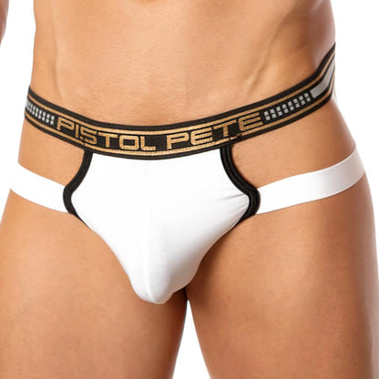 A person is wearing a Pistol Pete Backstop Jockstrap made of premium fabric, with black trim and an elastic waistband featuring the Pistol Pete logo. The photo focuses on the lower torso to showcase the jockstraps design and extra support.