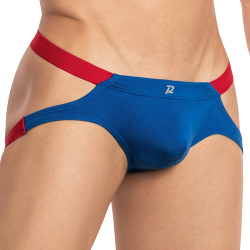 A person wearing a Pistol Pete Toro Jock with red waistband straps shows off the bull-inspired design, featuring a supportive pouch and small white logo, focusing on the midsection and thighs.