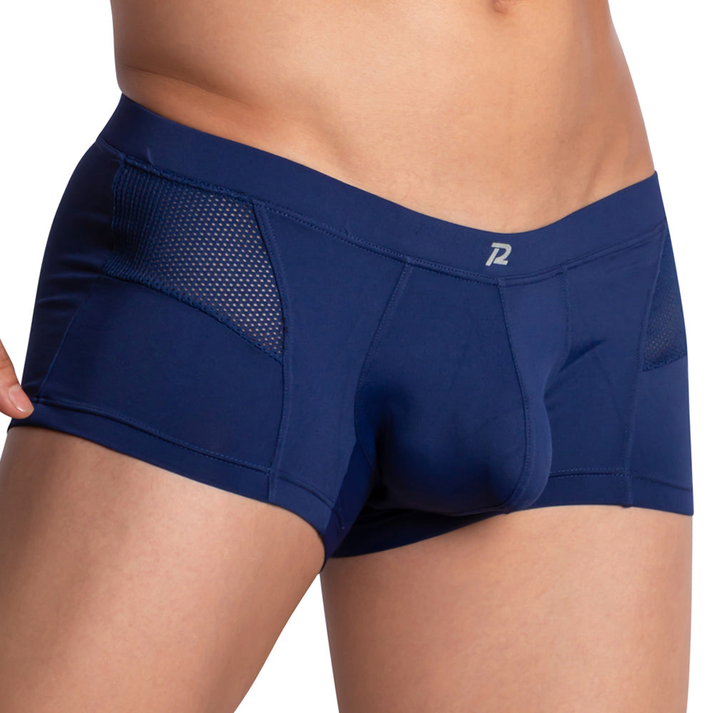 Someone is wearing Pistol Petes navy blue Side Mesh Boxer, featuring mesh sides for ventilation, a small logo on the waistband, and a contour-enhancing pouch.