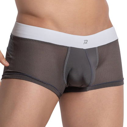 Someone is wearing Pistol Pete Fishnet See Through Boxers in charcoal gray, featuring a white waistband and showcasing a sexy, see-through fishnet fabric that highlights the waist and upper thigh area.