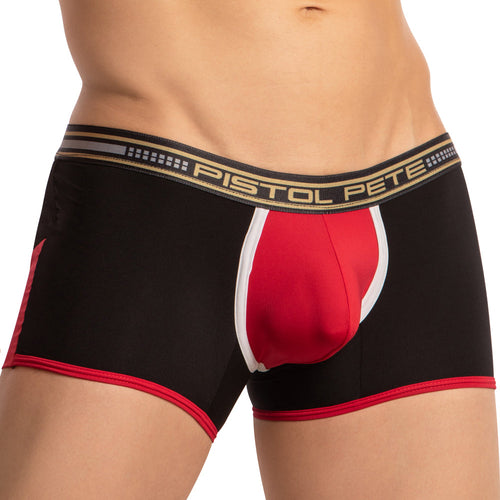 A person models Pistol Petes Athletic Wide Waistband Boxer Trunk in black and red, showcasing a sporty design with a red front panel, white trim, and comfortable stretchy cotton. The brand name is prominent on the waistband as they pose against a plain background, exuding sensual appeal.