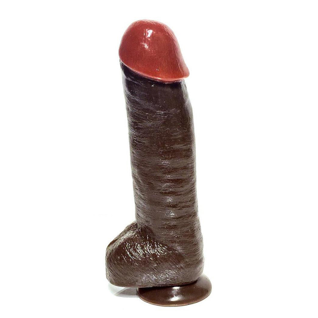 The Rascal Black Balled 12 Cock With Balls by Rascal Toys is a realistic, brown dildo featuring detailed features and a suction cup base, prominently displayed against a white background.