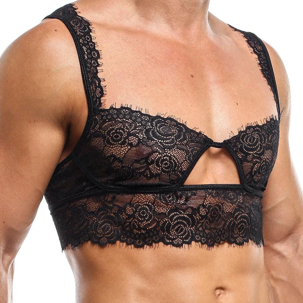 A person models the Secret Male Low Cut Bra, showcasing seductive mens lace lingerie with intricate floral patterns and a chest cut-out by Secret Male, highlighting intimate fashion on the upper torso.