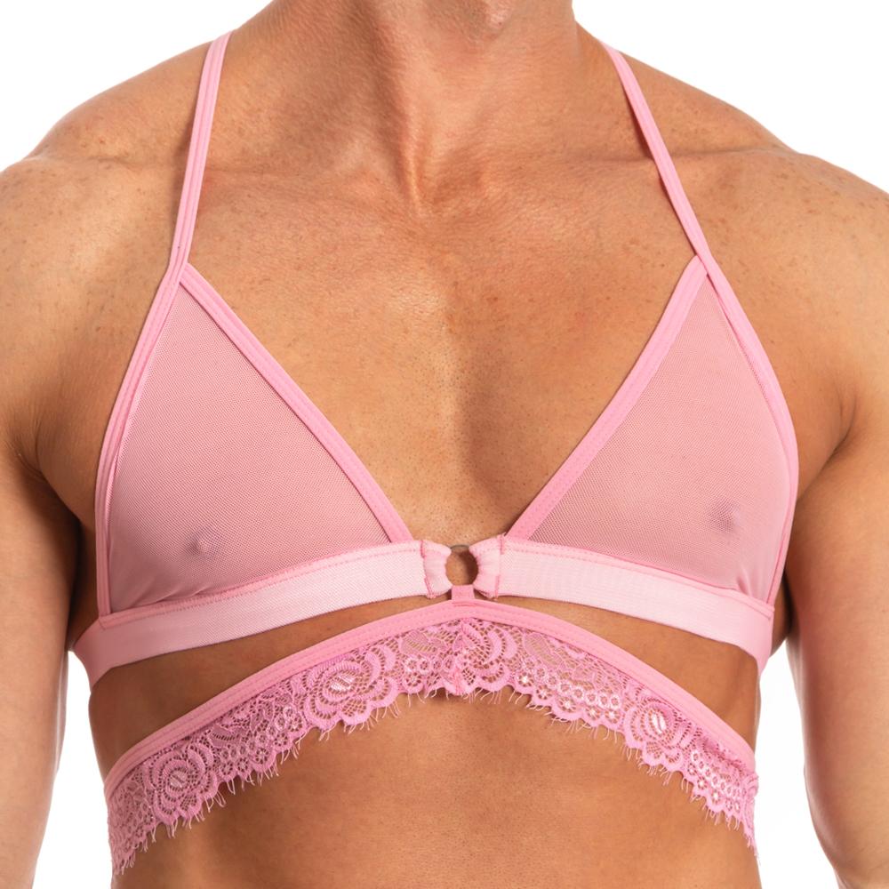 Wearing Secret Male SMA017 Justines Delight Bra, a pink mesh and lace bralette from Secret Male, crafted from lightweight polyamide with thin straps, showcasing a stylish and unique design.