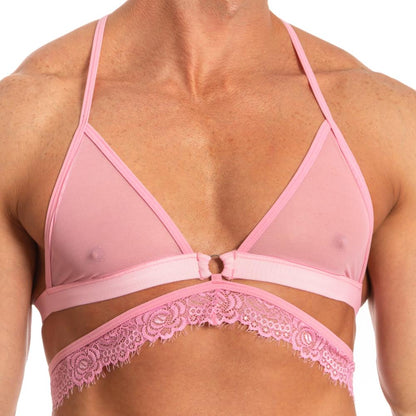 Wearing Secret Male SMA017 Justines Delight Bra, a pink mesh and lace bralette from Secret Male, crafted from lightweight polyamide with thin straps, showcasing a stylish and unique design.