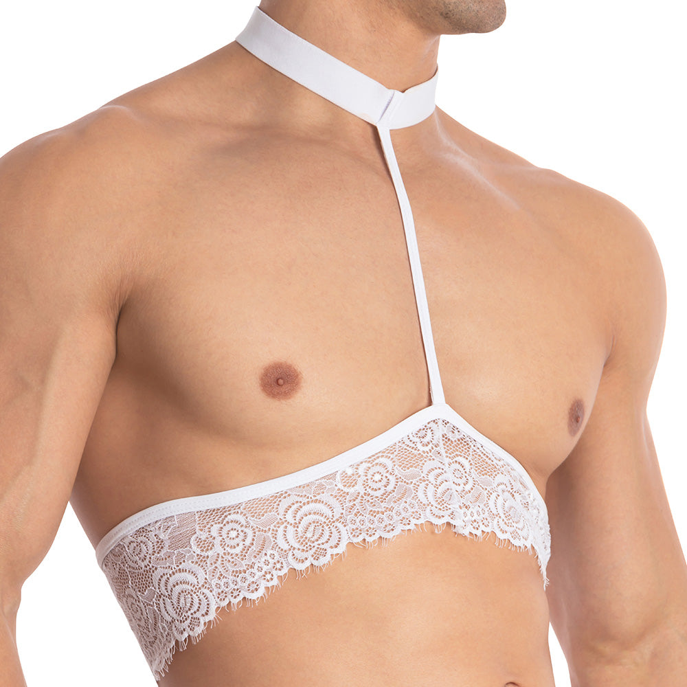 Wearing the Secret Male Throbbin Top, featuring a white lace design with floral patterns and a thin strap connecting to a white choker, provides a unique twist on mens lace top trends. The image captures the upper torso against a plain background.
