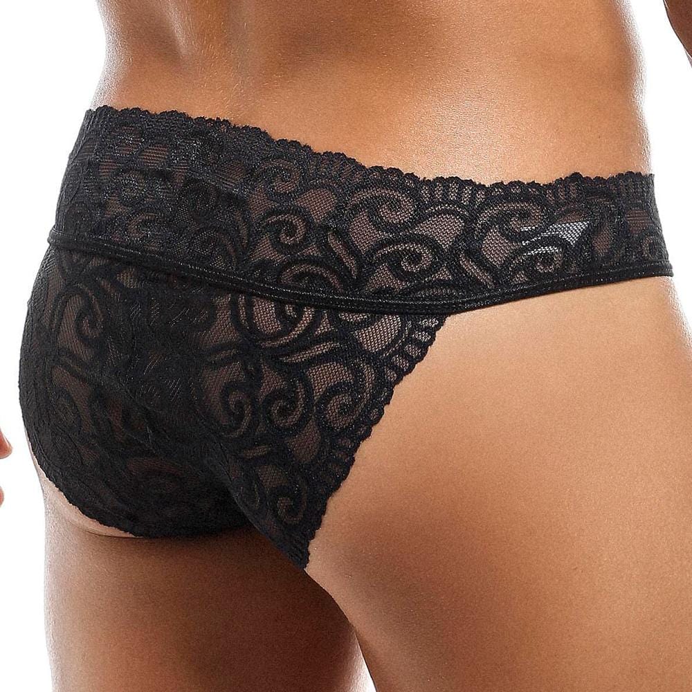 Wearing the Secret Male SMI025 Lace Bottom Bikini by Secret Male, a person showcases seductive black lace lingerie with an intricate floral pattern, beautifully highlighting the lower back and hip area.