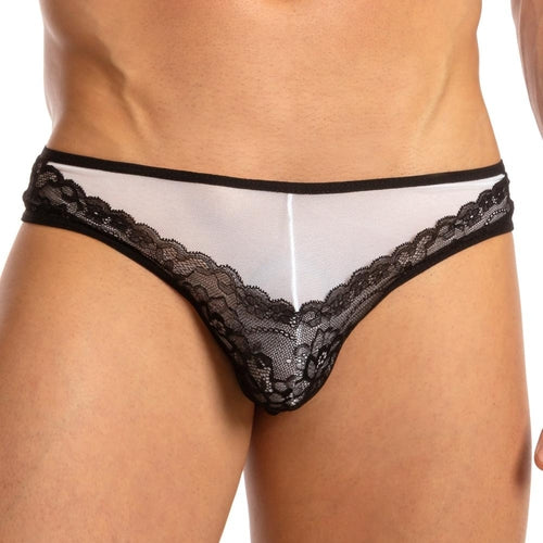 Someone is wearing the Secret Male French Maid Bikini from Secret Male, featuring a flirtatious and chic black lace-trimmed transparent design. The image highlights the exquisite detailing on the lower torso of this comfortable and stylish underwear.