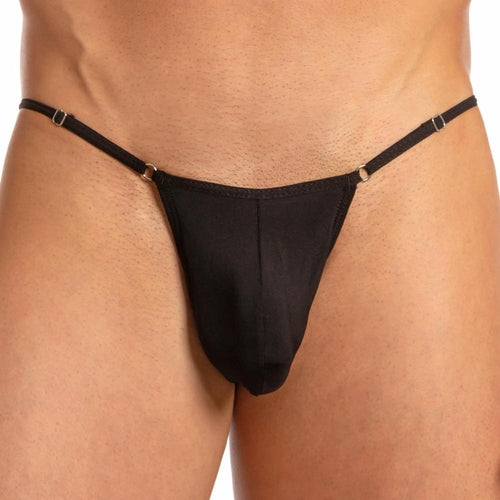 Someone wearing the Secret Male Lace Back Bikini by Secret Male, a minimalist black thong with thin side straps, offering a flattering fit against a neutral background.