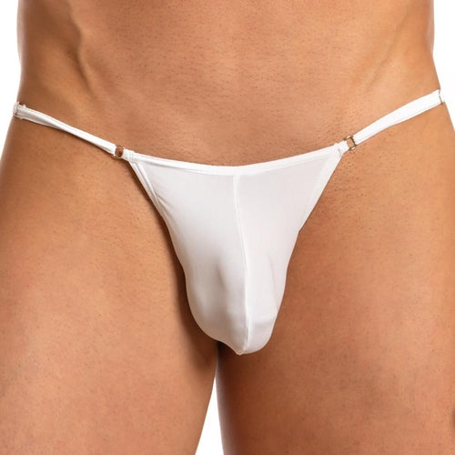 A close-up image showcases a person wearing the Secret Male Lace Back Bikini by Secret Male in white. Thin straps rest on the hips, providing a flattering fit and luxurious comfort, while minimal fabric elegantly covers the groin area. The background is not visible.