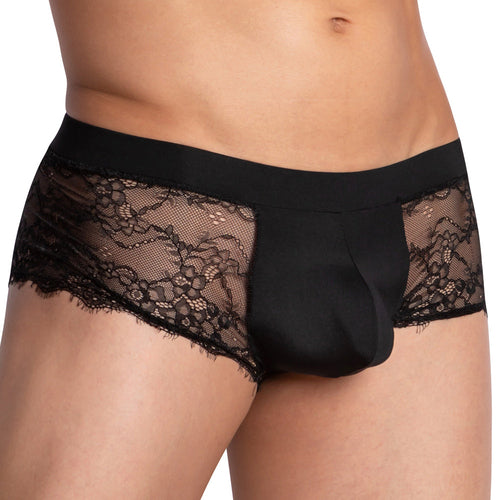 A person wearing Secret Male Sissy Mesh Bikinis flaunts an exquisite floral lace design. These black lace mens briefs feature intricate side patterns with a solid waistband and front, crafted from stretch fabric for ultimate comfort and style.