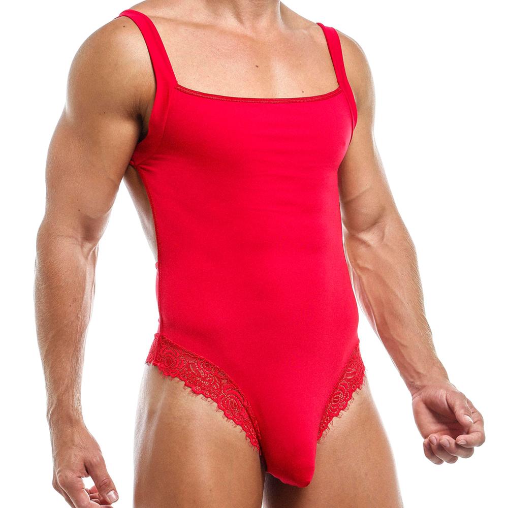Displaying a captivating style, an individual wears a form-fitting, red Secret Male Honeymoon Body Suit with lace side accents. This garment covers the torso and hips and sports wide shoulder straps over a simple white backdrop.