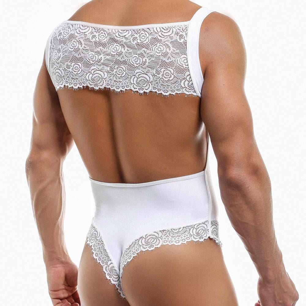 Wearing a Secret Male Honeymoon Body Suit, a person flaunts a seductive style with white floral lace patterns, featuring lace accents, a wide back band, and delicate leg trims for an alluring back view.