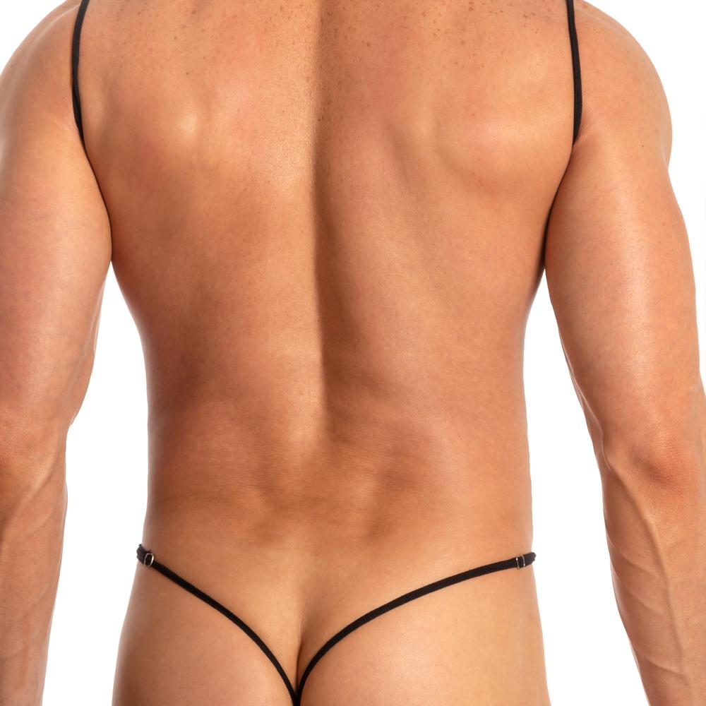 A muscular person, facing away, wears the Secret Male Deep V Body Suit in black. The elegant backless design reveals their toned back and shoulders. The minimal coverage clothing contrasts with a plain white background, showcasing the Secret Male brands stylish thong silhouette.