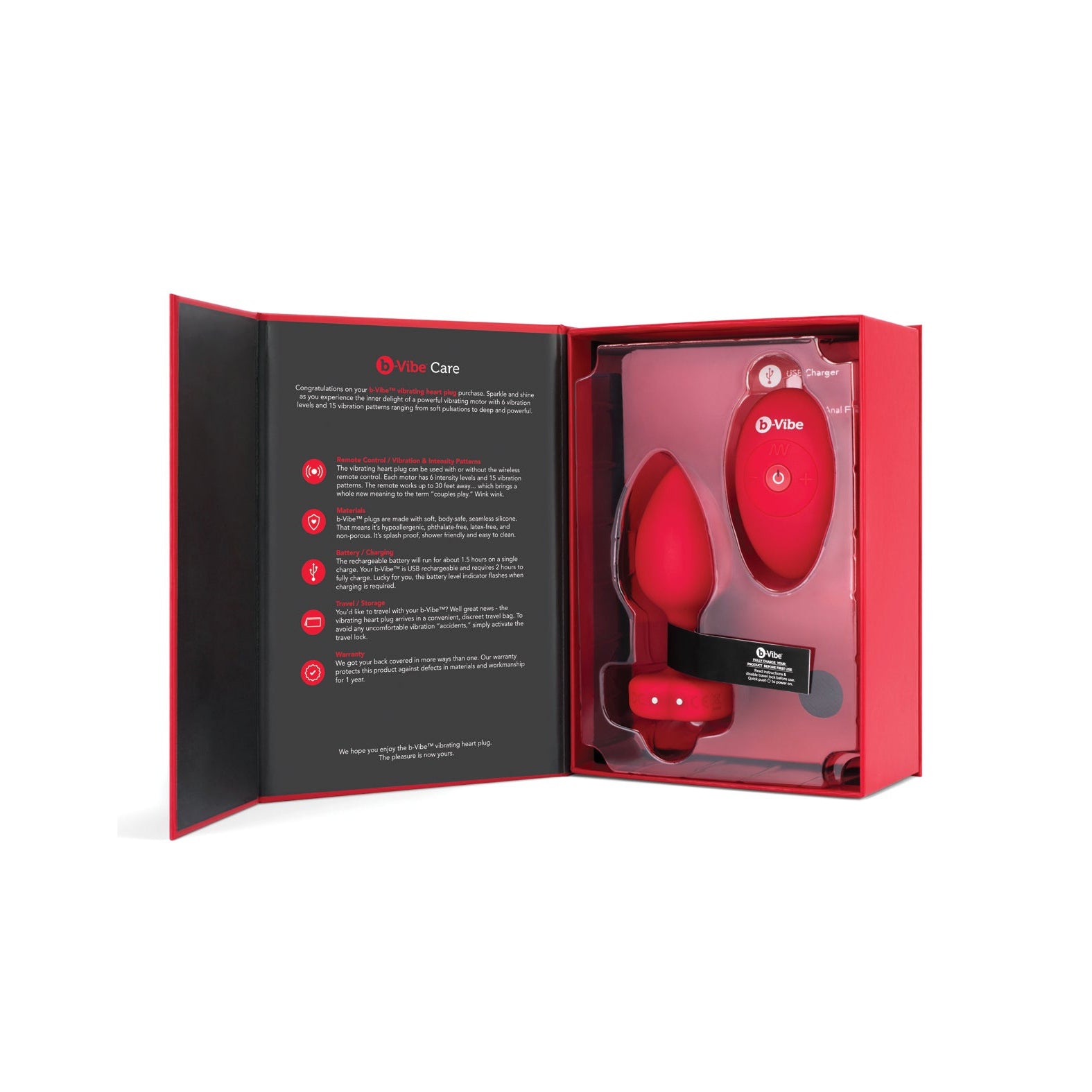 The open box reveals sleek, modern packaging in black and red, displaying a b-Vibe Vibrating Heart Plug adult toy set. On the left are a remote control and clear instructions for your anal adventures, featuring the b-vibe plug for added excitement.