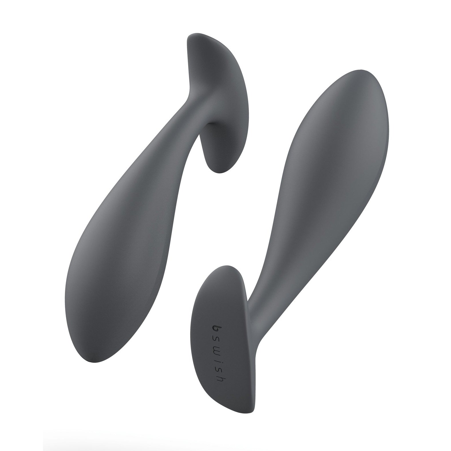 Two Bfilled Basic Plug prostate massagers in sleek, dark gray are showcased from various angles. Each features a curved, ergonomic design with a flared base for safety and a tapered head for increased anal pleasure. The soft silicone texture is highlighted by one being horizontal and the other vertical.