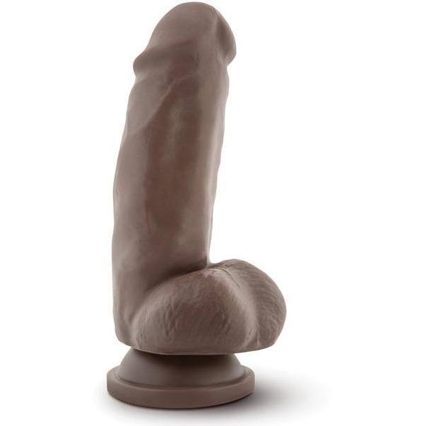 The Blush Novelties Dr. Skin Mr. Smith dildo features a realistic, girthy design with a suction base, closely resembling a penis, and stands upright against a plain white background.