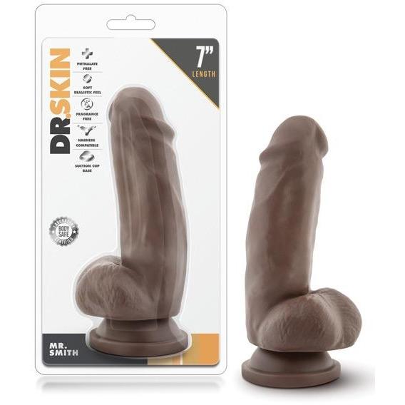 The packaging and display for the Blush Dr. Skin Mr. Skin 6 Dildo with Suction Cup - Mr. Smith by Blush Novelties highlight its realistic design, girthy form, soft realistic feel, and body safe materials, ensuring both appeal and safety for users.