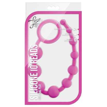 The Blush Luxe Silicone Beads by Blush Novelties in pink are designed for comfort and safety, featuring beads in ascending sizes with a handy loop. They come elegantly packaged in a clear case showcasing the body-safe materials.